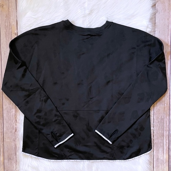 Nike Air Women’s Long Sleeve Running Top In Black - Picture 4 of 9